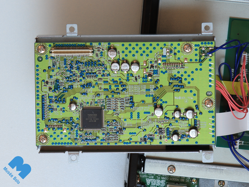 Before – slightly swollen capacitor to the left of the Toshiba circuit